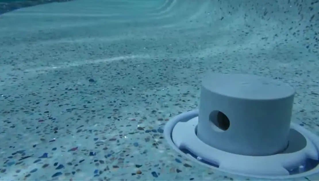 A typical pop-up cleaning jet in a self-cleaning pool system