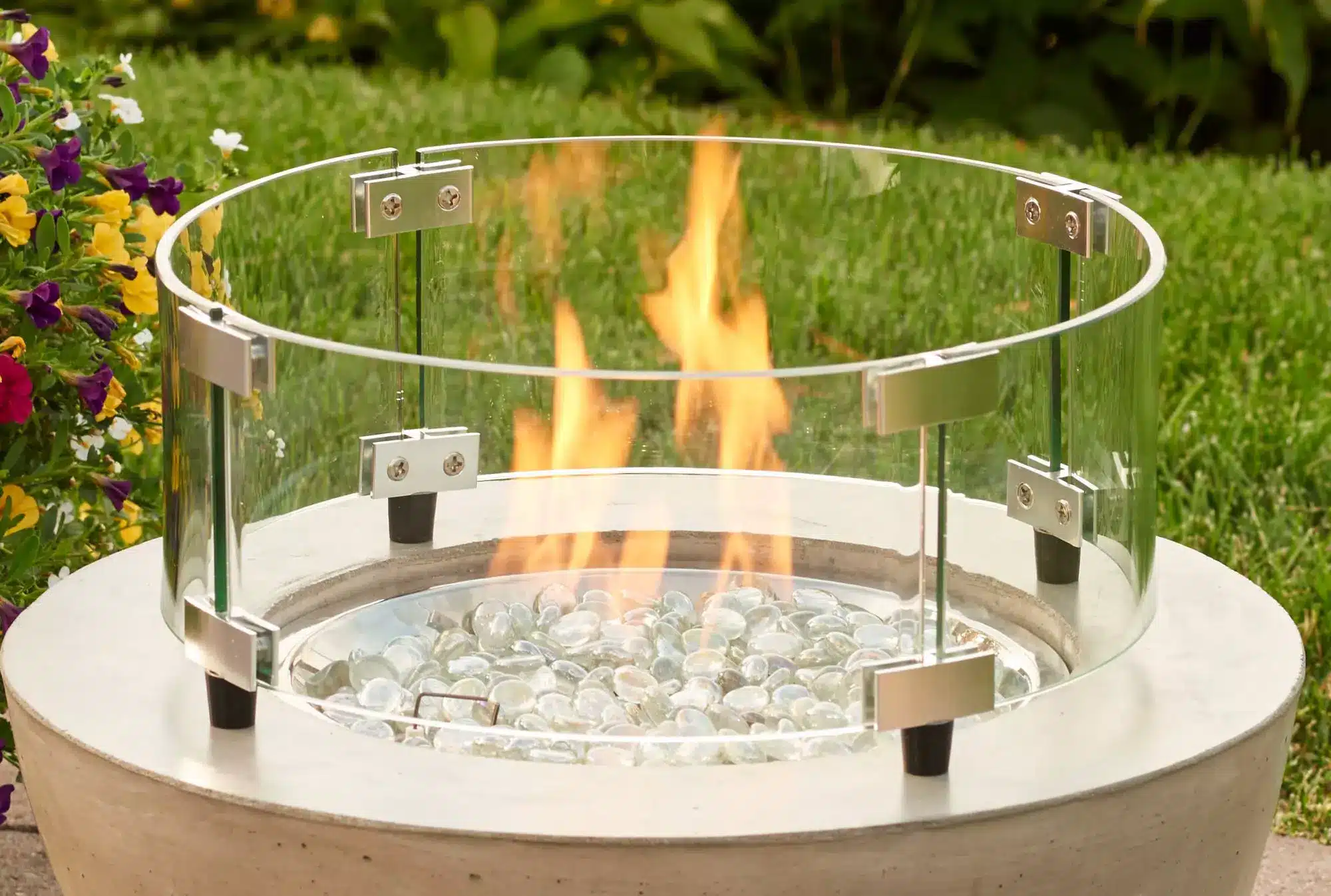 Glass fire pits create a luxurious ambiance with their stunning visual appeal.