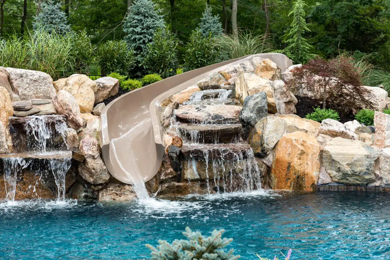 The Ultimate Pool Slide with Rocks Guide for Your Private Paradise